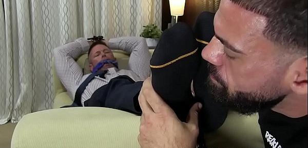  Muscular businessman Joey J bound by feet eating deviant